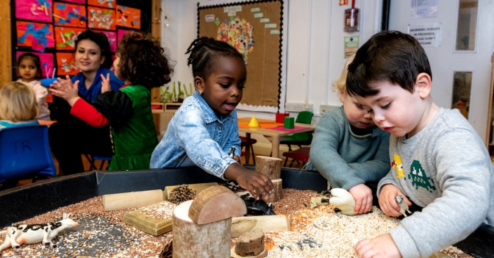 Children playing & learning, using multiple materials and textures